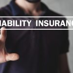 Person clicking liability insurance screen button