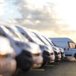 Group of fleet vehicles on the open parking space