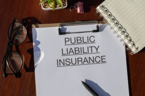 Public Liability Insurance document on desk highlighting essential business protection coverage in South Africa